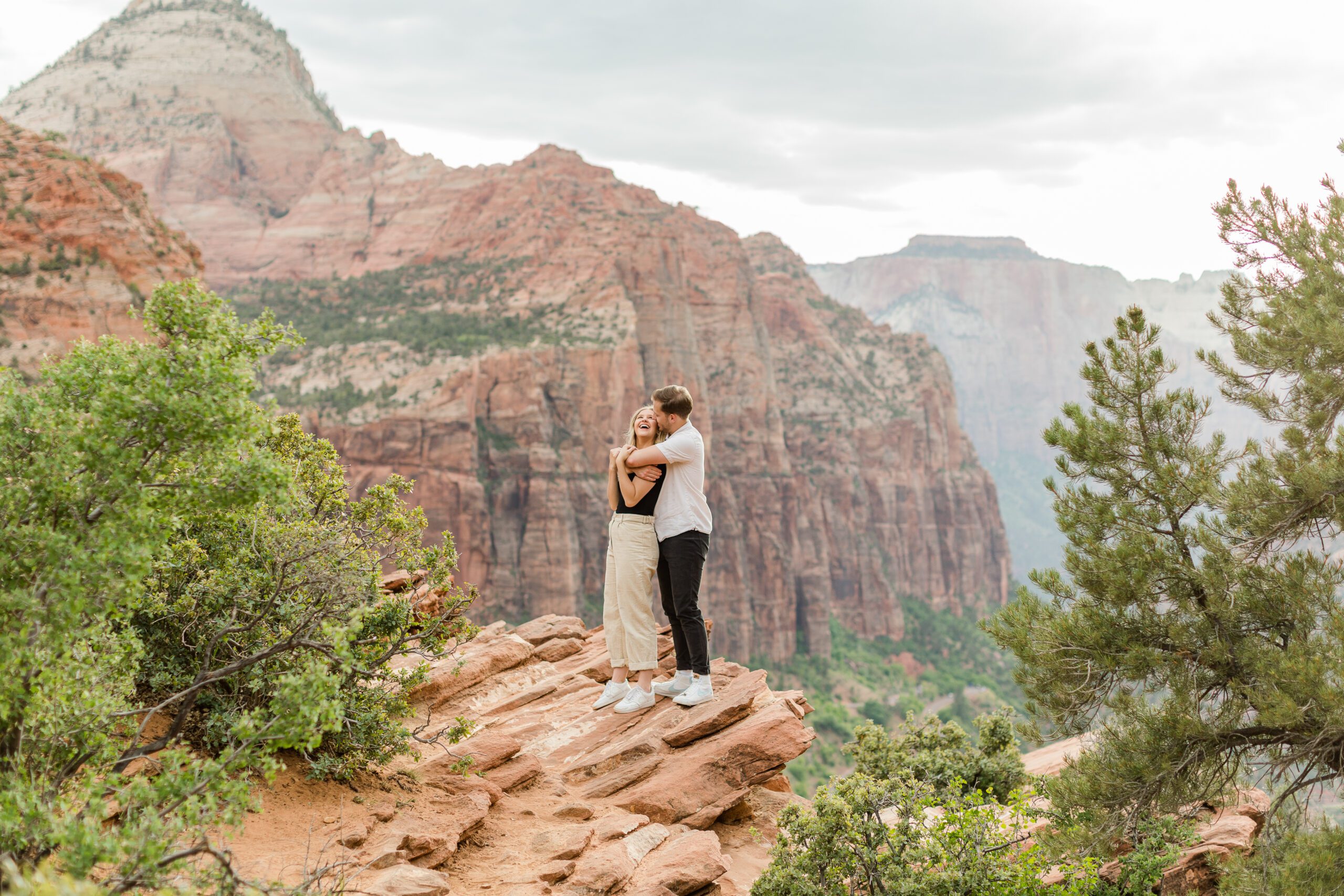 Couple at the top of zion national park, engagement session