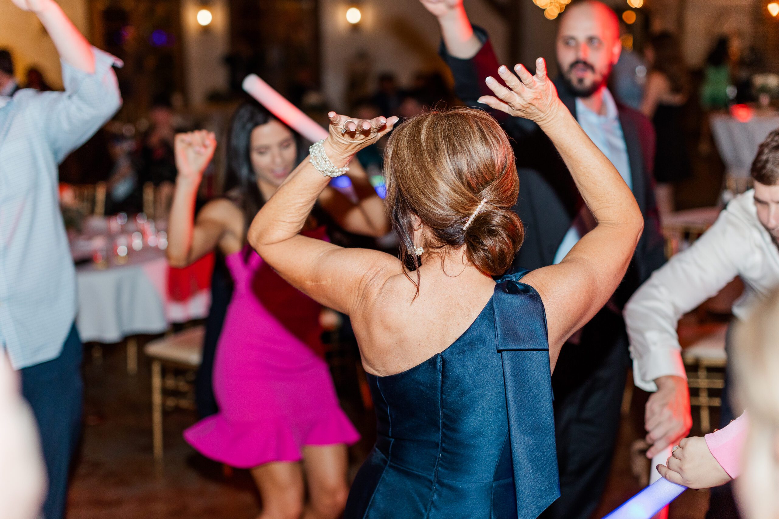 wedding guest dancing at a party wedding reception